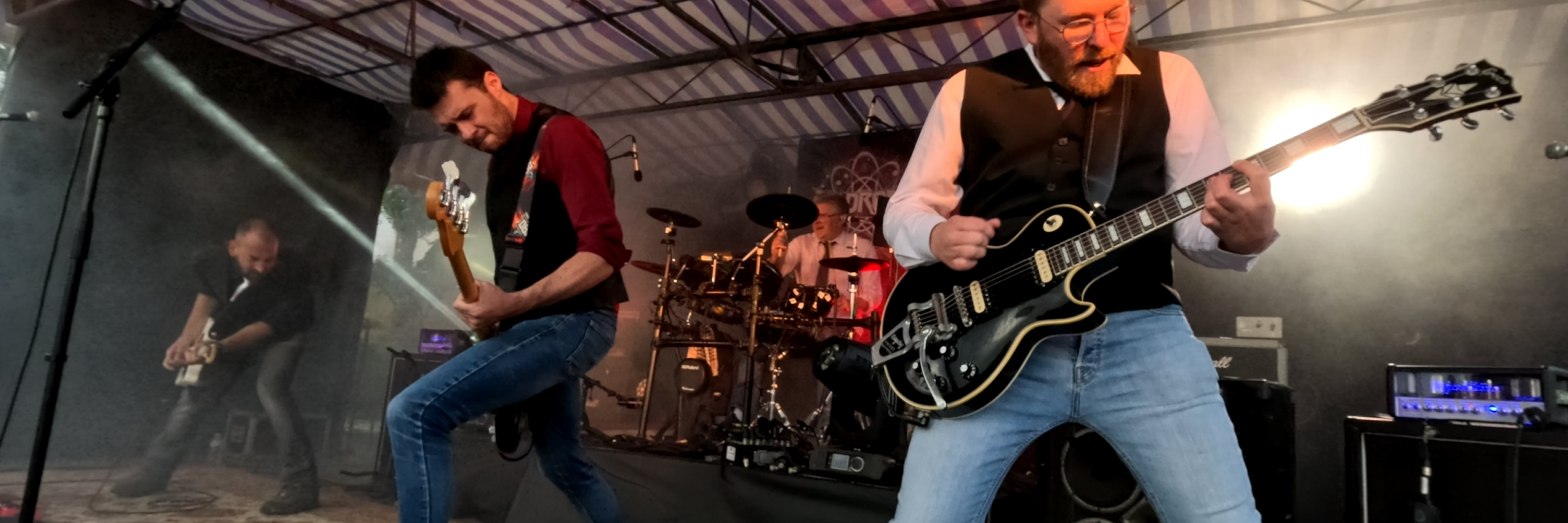 Hadron, groupe de musique Rock en représentation à Calvados - photo de couverture